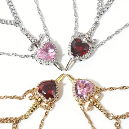 COLLAR DE PAREJA CORAZON CON ESPADA